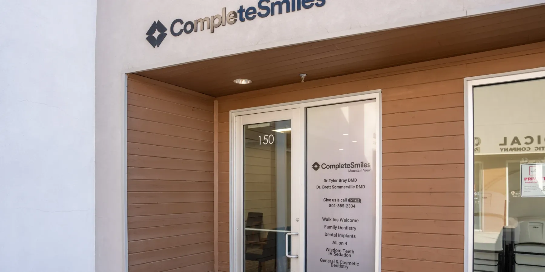 Entrance to the Mountain View office with the Complete Smiles sign on the door | Complete Smiles-Cottonwood Heights-Mountain View-Redwood-Utah