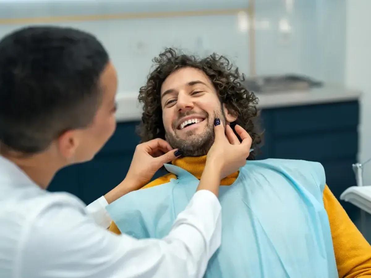 A young man smiling after cosmetic dental treatment | Complete Smiles-Cottonwood Heights-Mountain View-Redwood-Utah
