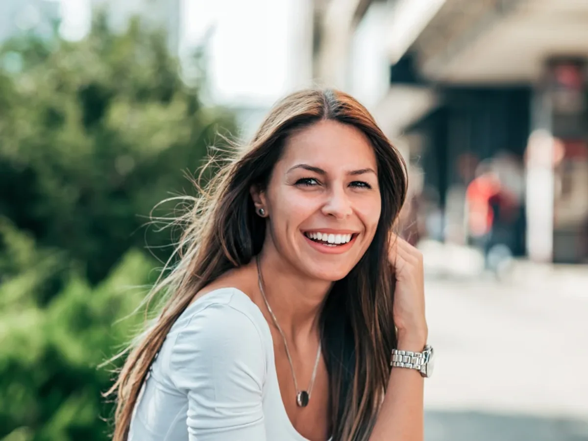 A woman smiling after a professional whitening treatment | Complete Smiles-Cottonwood Heights-Mountain View-Redwood-Utah