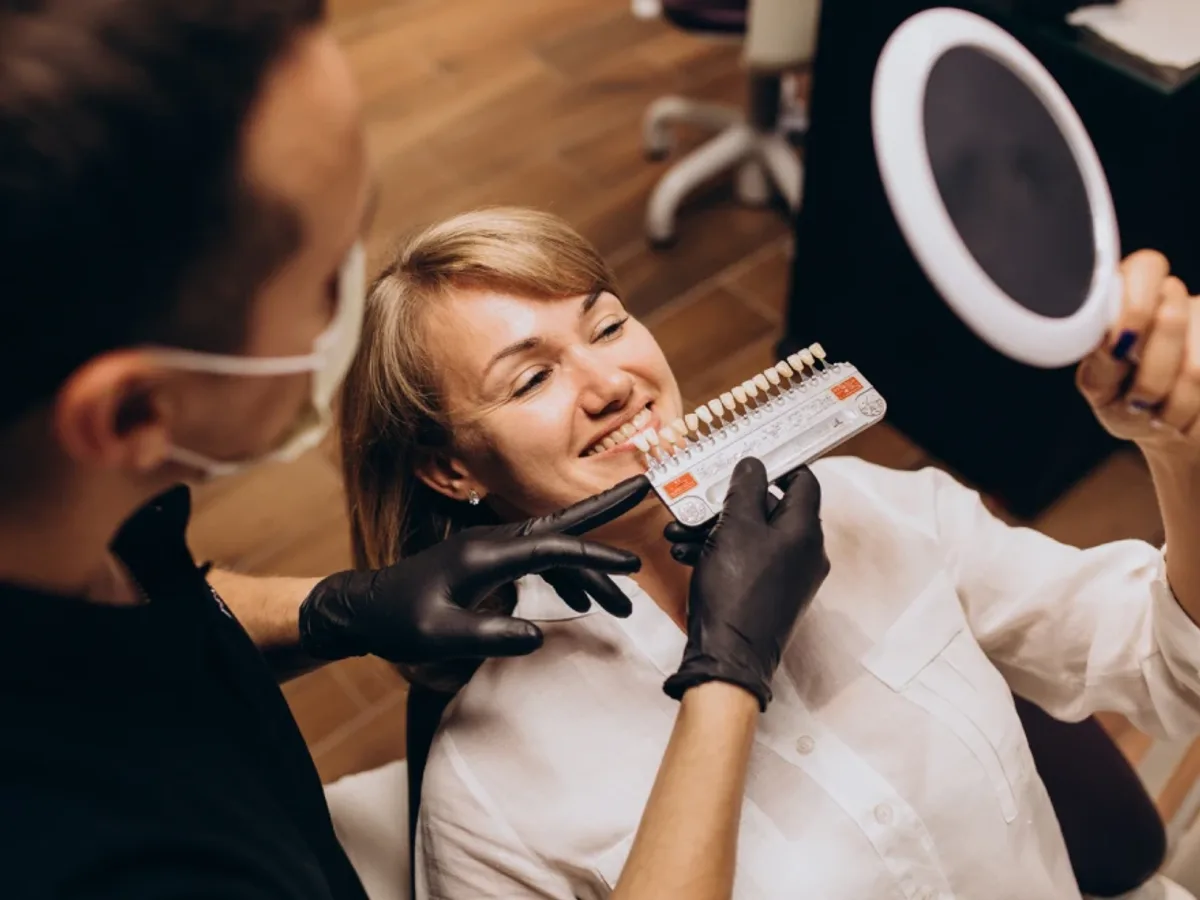 A woman in her forties smiling with porcelain veneers | Complete Smiles-Cottonwood Heights-Mountain View-Redwood-Utah