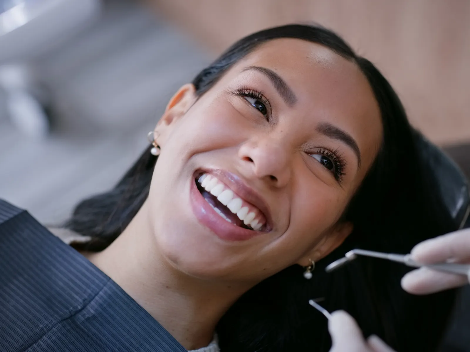 A dentist checking a patient’s restored tooth | Complete Smiles-Cottonwood Heights-Mountain View-Redwood-Utah